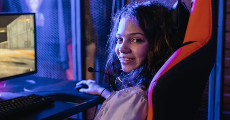 Gaming Monitor - Woman Wearing White Jacket Sitting on Chair