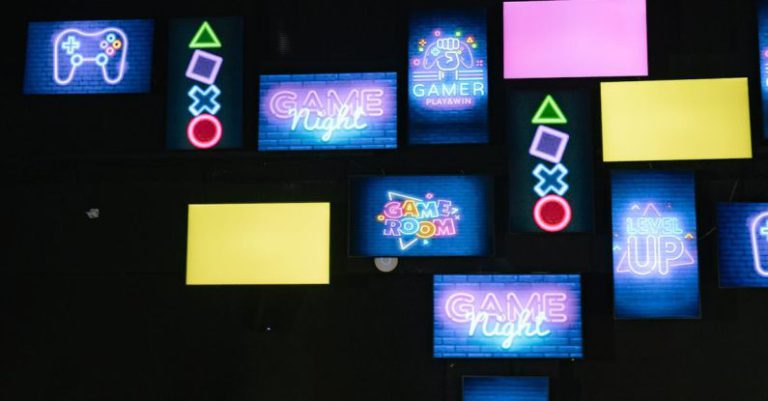 Multi-monitor Gaming - Lighted Screen Monitors Inside a Gaming Computer Shop