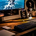 Gaming Cables - black corded gaming computer keyboard and flat screen monitor