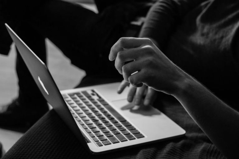 Data Analysis Computing - grayscale photo of person using MacBook