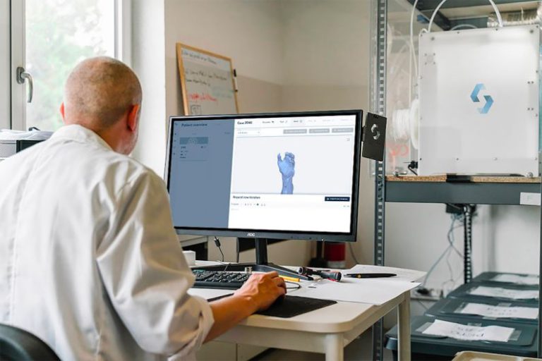 3D Modeling - man in white dress shirt sitting in front of computer