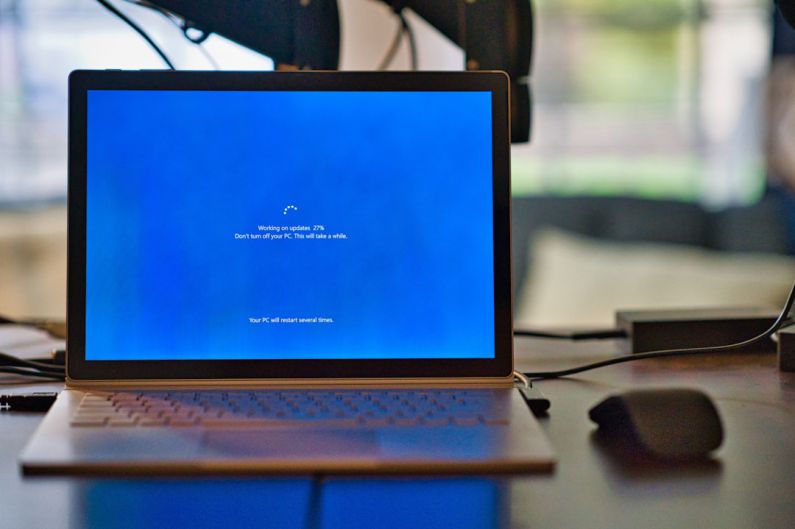 Laptop Upgrade - macbook pro on brown wooden table
