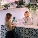 Build Vs Buy - woman facing on white counter