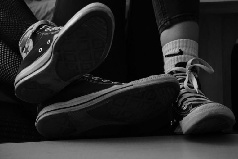 Compatibility Issues - a pair of black and white shoes