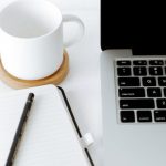Desktop Assembly - Workplace with laptop and opened diary
