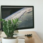 Multi-monitor Setup - Silver Imac on Brown Table Inside Room
