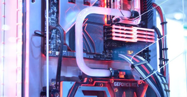 Water Cooling - Black and Red Computer Motherboard