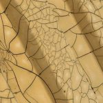 Acrylic Panel - From above of geometric yellow surface with symmetric patterns and cracks as abstract background