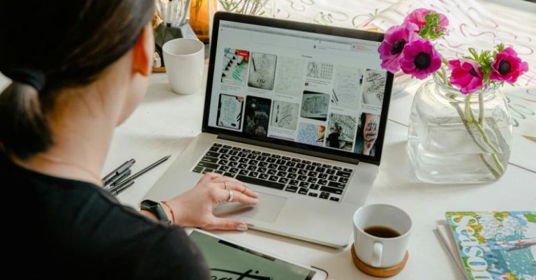 Desktop Themes - Photo Of Person Using Laptop For Graphic Designs