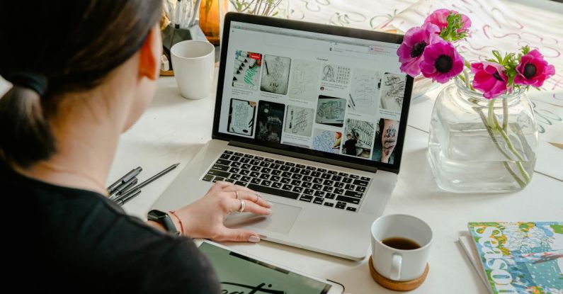 Desktop Themes - Photo Of Person Using Laptop For Graphic Designs