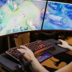 High-end Gaming - A Woman Playing League of Legends