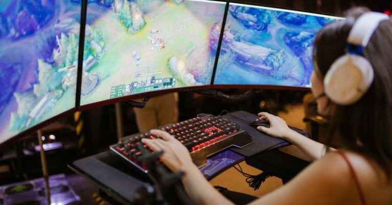 High-end Gaming - A Woman Playing League of Legends