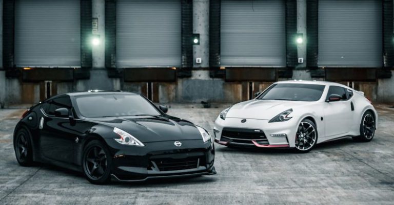 Fast Storage - Shiny new coupe cars parked near warehouse