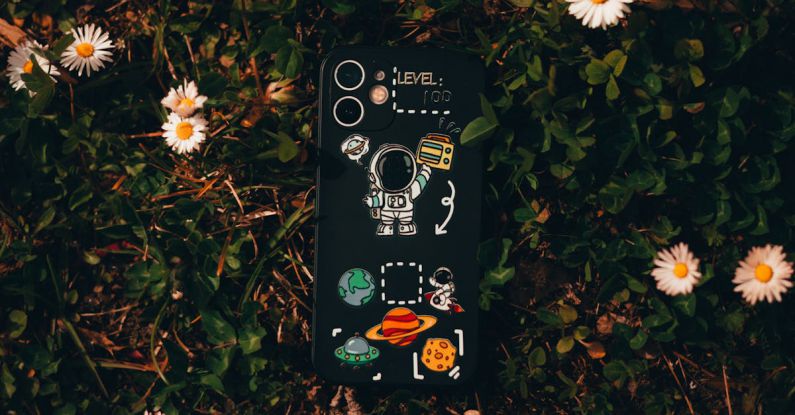 Case Fans Airflow - Phone with Creative Case on Grass with Flowers